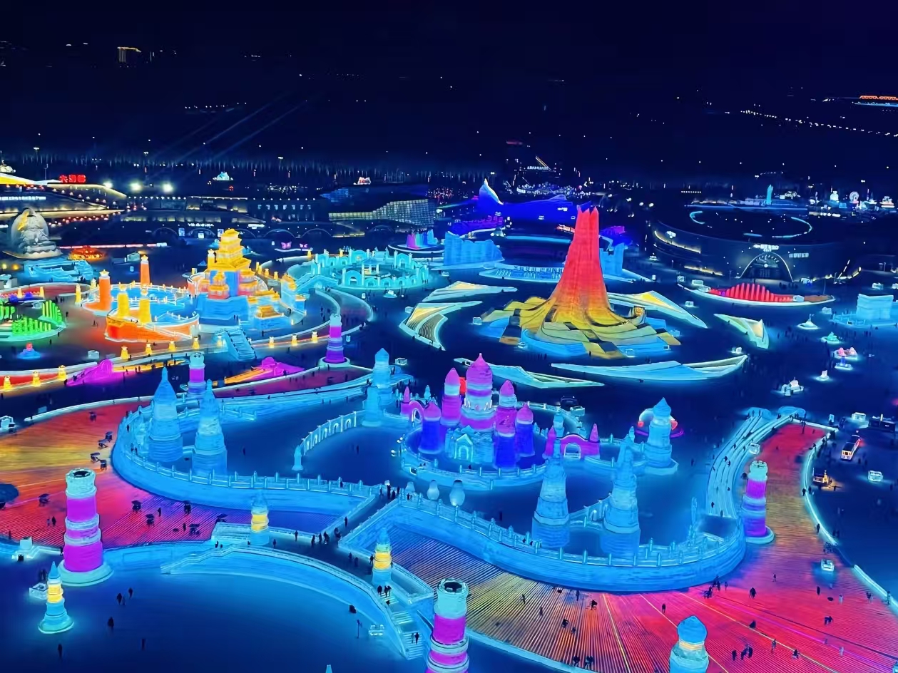 Harbin Ice and Snow World wide colorful view with illuminated ice castles and towers