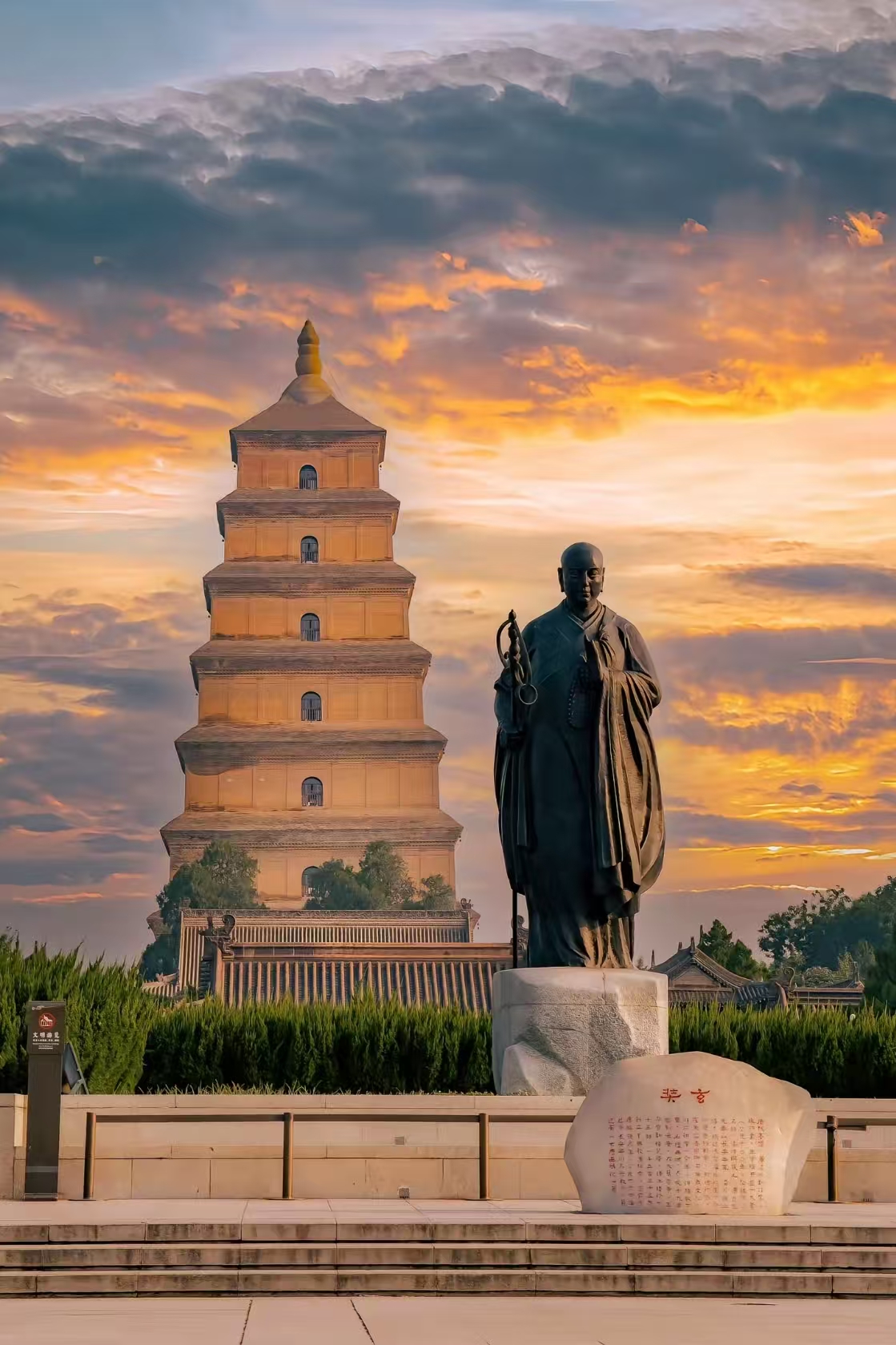 Giant Wild Goose Pagoda and Xuanzang statue Xi'an at sunset